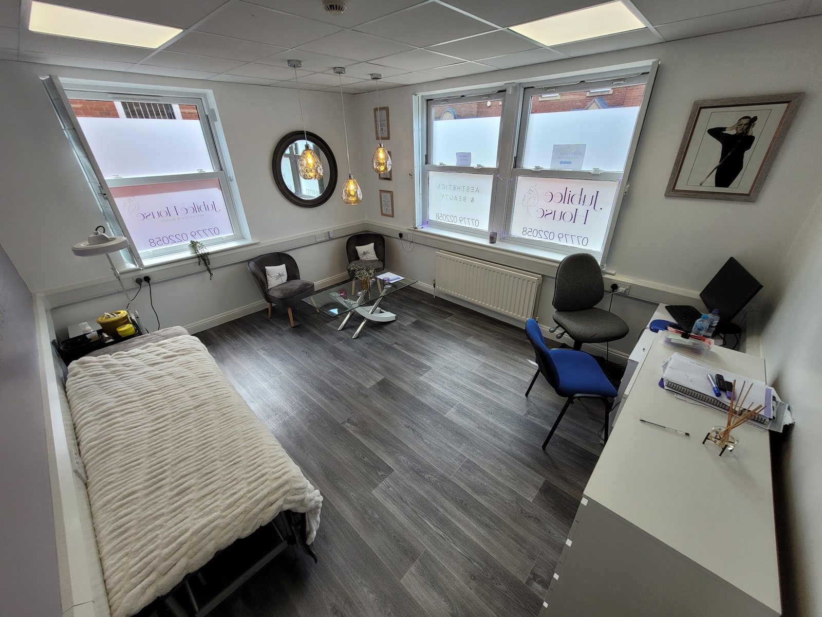The treatment room, with the Jubilee House name on both windows